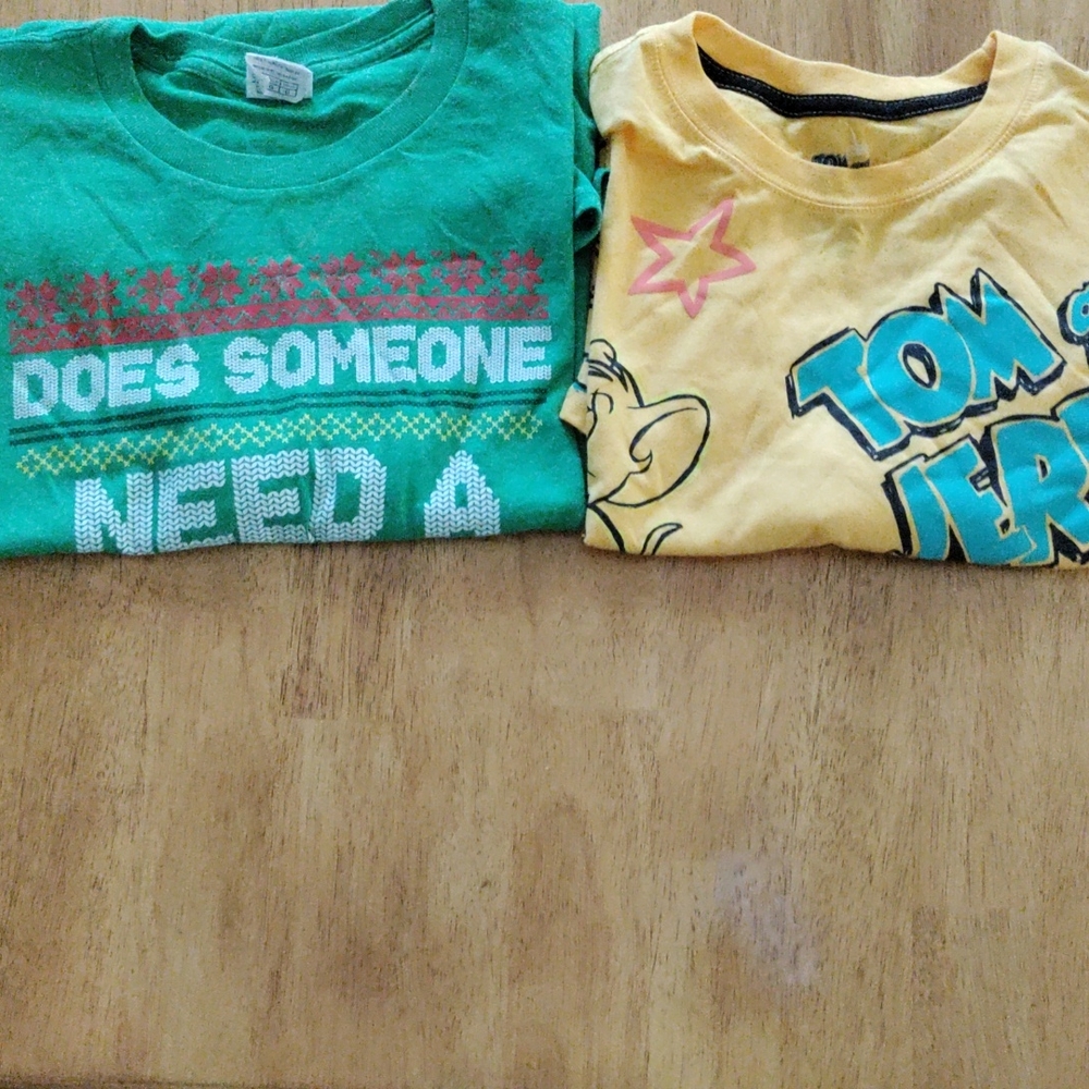 Men's Christmas elf t shirt and a Tom and Jerry t shirt, medium and small.